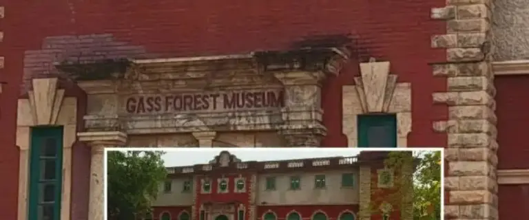 Front exterior view of Gass Forest Museum Coimbatore showing colonial-era architecture with red brick facade and arched windows