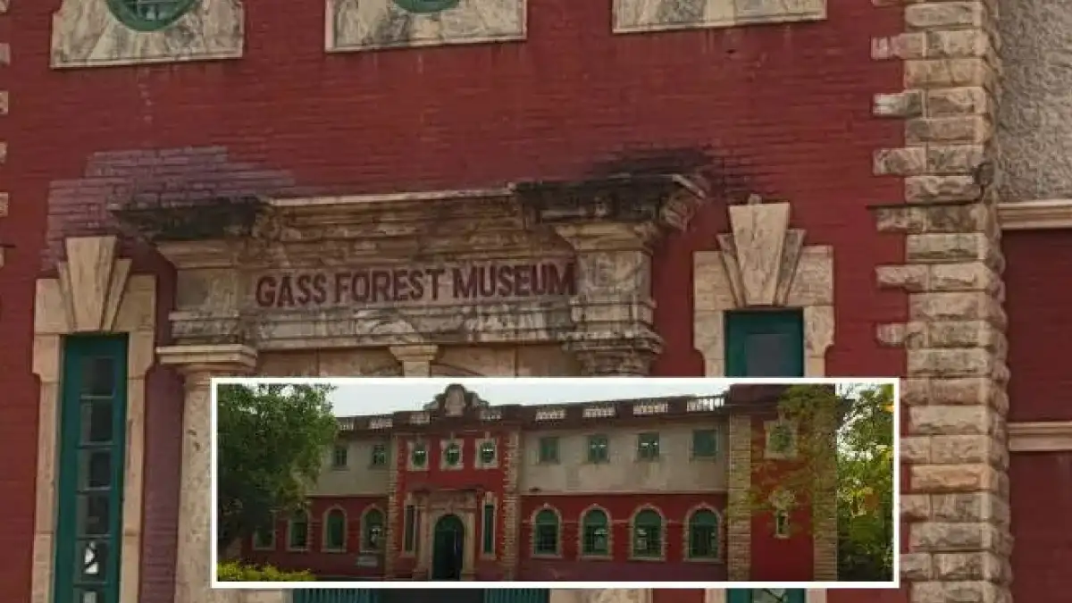Front exterior view of Gass Forest Museum Coimbatore showing colonial-era architecture with red brick facade and arched windows