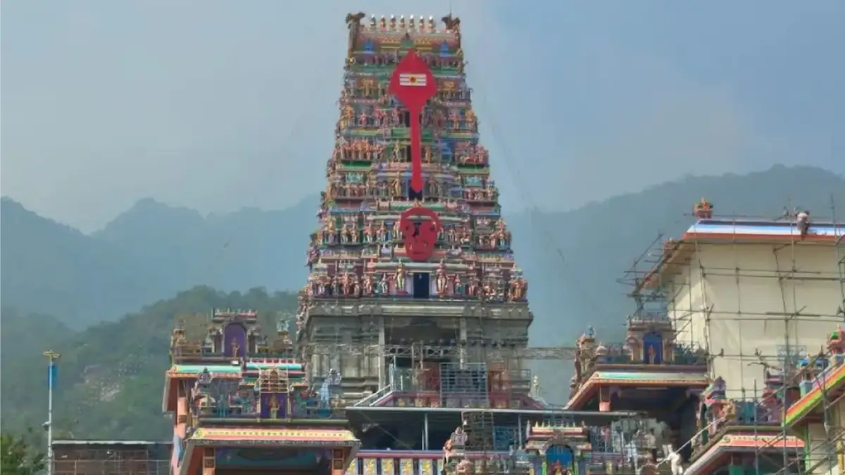 Front view of Marudhamalai Arulmigu Subramaniyaswami Temple gopuram in Coimbatore, dedicated to Lord Murugan, set against the Western Ghats