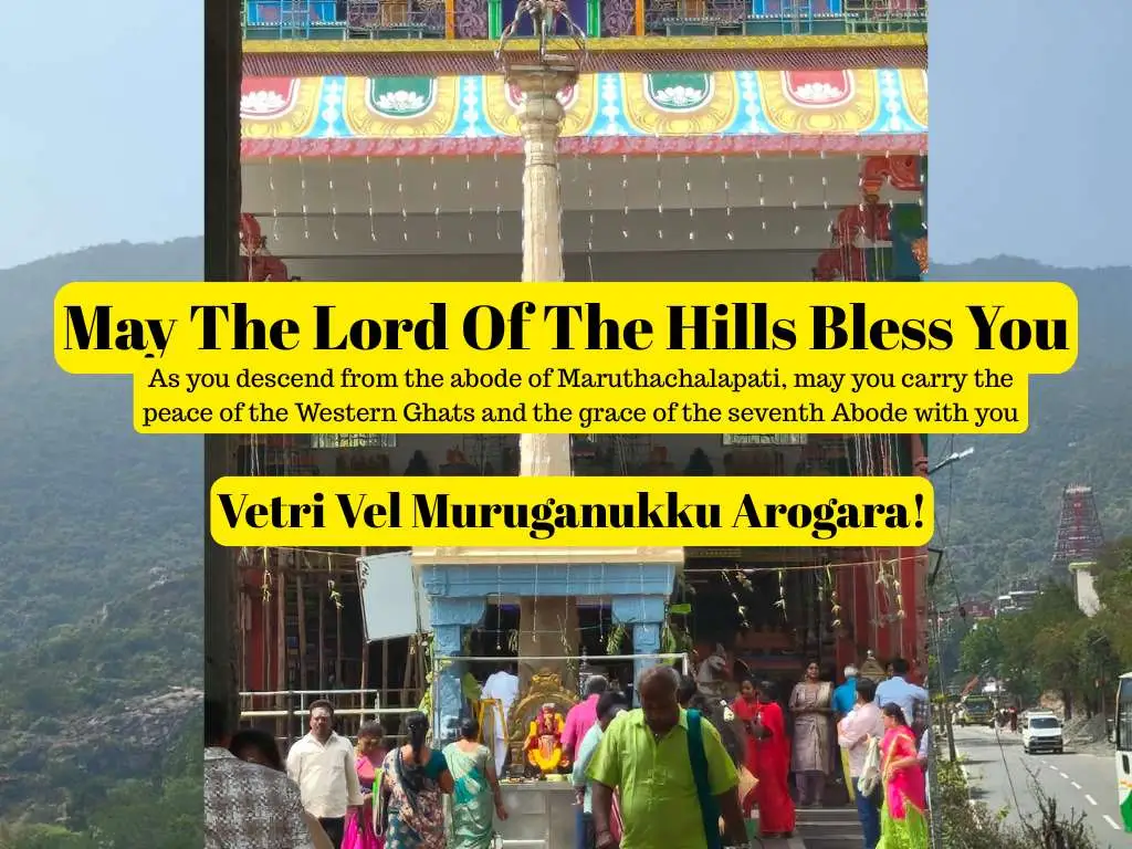 Devotees at the hilltop entrance of Marudhamalai Temple in Coimbatore with blessing message dedicated to Lord Murugan