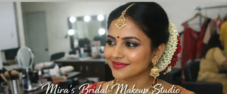 Indian bride with professional bridal makeup by Mira’s Bridal Makeup Studio in Coimbatore wearing traditional wedding saree and jewelry