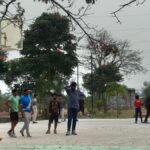 Basketball court with youngsters playing at Kumaraswamy Lake Park near R.S. Puram, Coimbatore