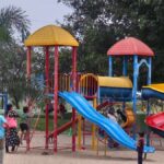Multi-tower children's playground with slides and crawl tunnel at Kumaraswamy Lake Park, Coimbatore