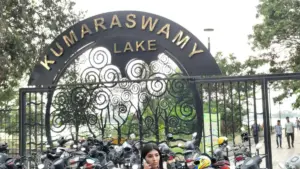 Kumaraswamy Lake Park main entrance arch with golden lettering and artistic tree metalwork, Thadagam Road, Coimbatore