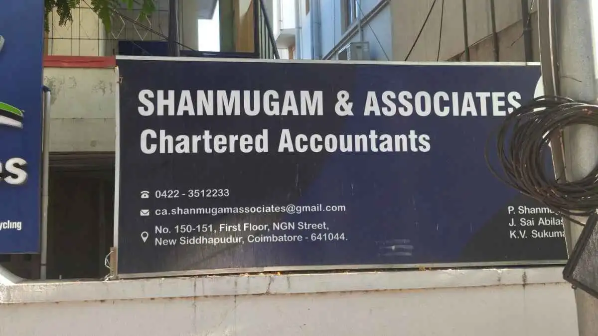 Shanmugam & Associates Chartered Accountants office signboard in Coimbatore